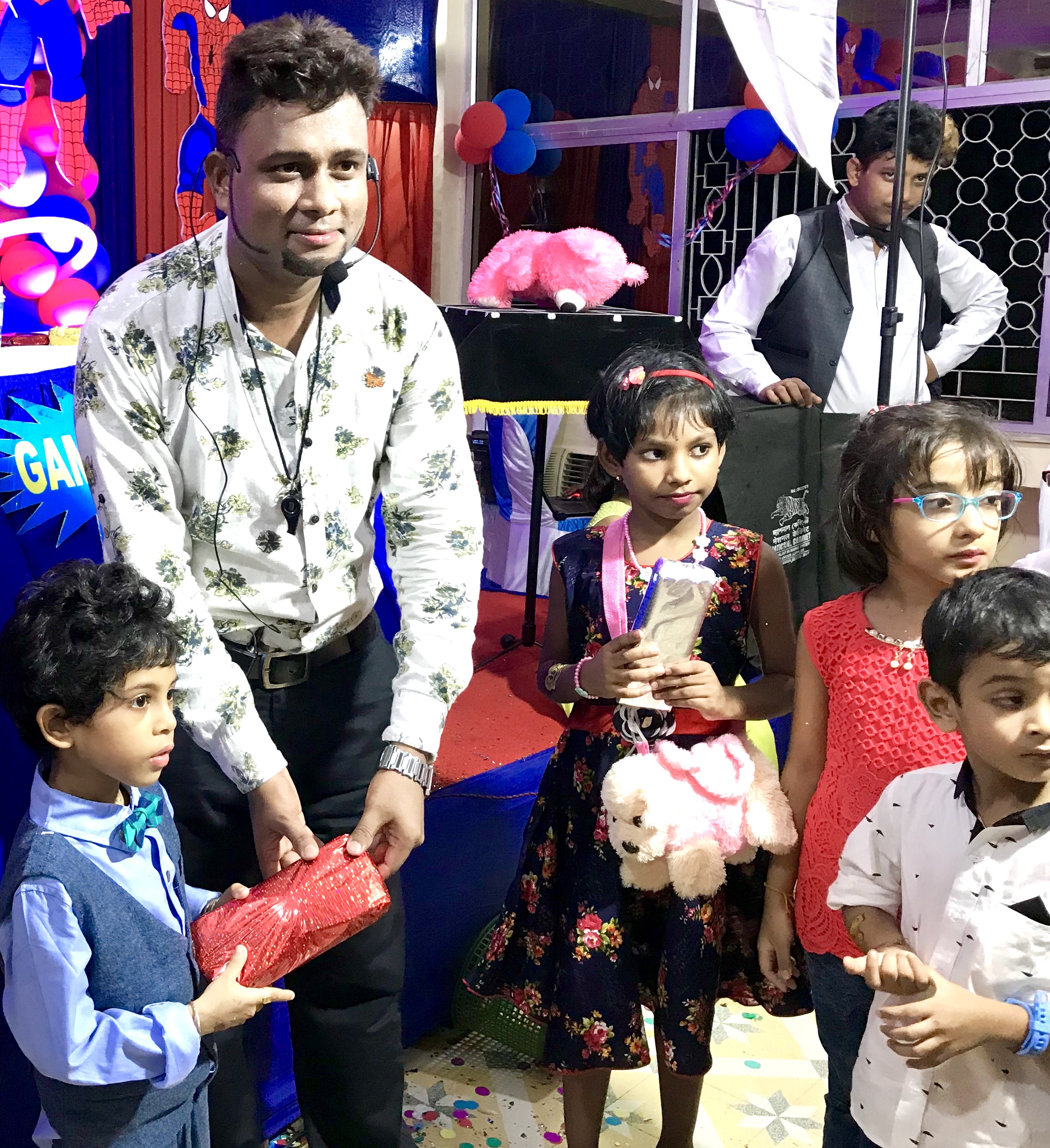 Magician A.Sarkar conducting a Game Show to Kids